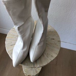 White pleather booties 4 inch heels.
